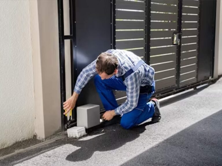 a person is troubleshooting issues with sliding gate openers